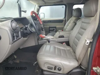 2003 Hummer H2 with VIN 5GRGN23UX3H147490, listed as a Copart auction lot 82876424 with 241,737 mi miles and Clean Title. Bid and sale history available at carsss.com. Image 7.