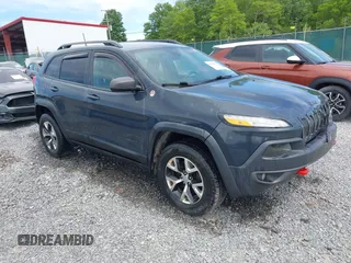 2017 Jeep Cherokee Trailhawk with VIN 1C4PJMBS1HW569093, listed as a IAAI auction lot 42286940 with 121,876 mi miles and . Bid and sale history available at DreamBid. Image 1.