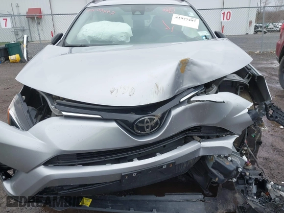 2018 Toyota RAV4 LE z VIN JTMBFREV6JJ236518, wystawiony jako IAAI lot #41977497 z przebiegiem 55 816 mil mil oraz . Historia ofert i sprzedaży dostępna na DreamBid. Obrazek 6.