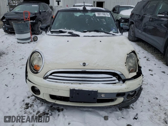 2010 MINI Convertible with VIN WMWMR3C50ATU97287, listed as a Copart auction lot 89116615 with 120,323 mi miles and Salvage Title. Bid and sale history available at DreamBid. Image 5.