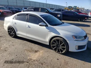2014 Volkswagen Jetta GLI with VIN 3VW4T7AJ8EM287825, listed as a Copart auction lot 61809114 with 123,305 mi miles and Salvage title. Bid and sale history available at DreamBid. Image 4.