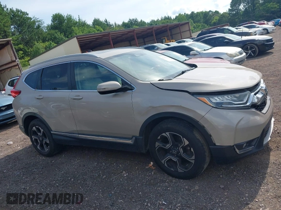 2018 Honda CR-V Touring with VIN 5J6RW2H96JL000910, listed as a IAAI auction lot 42490580 with 201,534 mi miles and . Bid and sale history available at DreamBid. Image 13.