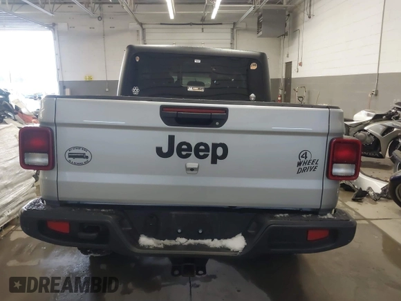 2023 Jeep Gladiator Sport S с VIN 1C6HJTAG1PL558131, выставлен на аукционе IAAI как лот 41252271 с пробегом 42 582 миль миль и . История ставок и продаж доступна на DreamBid. Изображение 17.