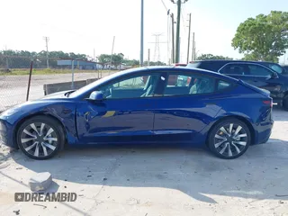 2024 Tesla Model 3 z VIN 5YJ3E1EA4RF751347, wystawiony jako IAAI lot #42185531 z przebiegiem 9328 mil mil oraz . Historia ofert i sprzedaży dostępna na DreamBid. Obrazek 13.