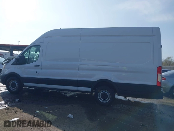 2022 Ford Transit Cargo z VIN 1FTBW3X81NKA04543, wystawiony jako IAAI lot #41763336 z przebiegiem 128 518 mil mil oraz . Historia ofert i sprzedaży dostępna na DreamBid. Obrazek 14.