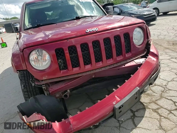 2016 Jeep Patriot Latitude with VIN 1C4NJPFA1GD810655, listed as a Copart auction lot 61093715 with 172,936 mi miles and Salvage title. Bid and sale history available at DreamBid. Image 13.