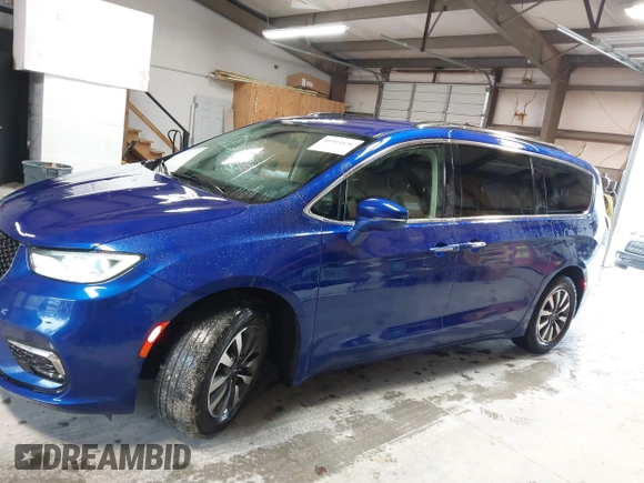 2021 Chrysler Pacifica Touring L z VIN 2C4RC1BGXMR503108, wystawiony jako IAAI lot #41914136 z przebiegiem 98 685 mil mil oraz . Historia ofert i sprzedaży dostępna na DreamBid. Obrazek 14.