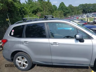 2014 Subaru Forester Premium with VIN JF2SJAGC0EH473208, listed as a IAAI auction lot 42800673 with 186,698 mi miles and . Bid and sale history available at DreamBid. Image 13.