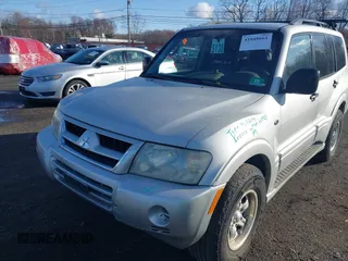 2003 Mitsubishi Montero z VIN JA4NW31S93J037224, wystawiony jako IAAI lot #41848661 z przebiegiem 206 151 mil mil oraz . Historia ofert i sprzedaży dostępna na DreamBid. Obrazek 13.
