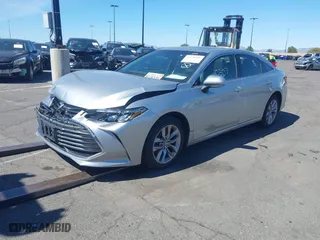 2019 Toyota Avalon Hybrid Limited with VIN 4T1B21FB1KU003112, listed as a IAAI auction lot 41610307 with 169,569 mi miles. Bid and sale history available at carsss.com. Image 2.