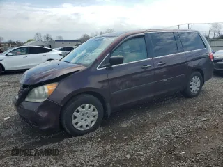 2009 Honda Odyssey LX z VIN 5FNRL38299B059665, wystawiony jako Copart lot #51244215 z przebiegiem 112 107 mil mil oraz Szkoda całkowita • Salvage title. Historia ofert i sprzedaży dostępna na DreamBid. Obrazek 1.