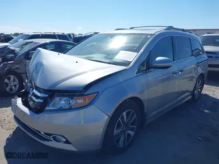 2016 Honda Odyssey Touring Elite with VIN 5FNRL5H91GB158499, listed as a IAAI auction lot 41899037 with 119,364 mi miles. Bid and sale history available at carsss.com. Image 17.