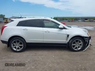 2012 Cadillac SRX Performance Collection with VIN 3GYFNEE34CS579352, listed as a IAAI auction lot 42627607 with 168,752 mi miles and . Bid and sale history available at DreamBid. Image 13.