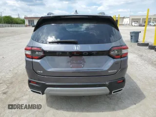2024 Honda Pilot Touring z VIN 5FNYG1H74RB036990, wystawiony jako Copart lot #56254385 z przebiegiem Nie podano mil oraz Szkoda całkowita • Salvage title. Historia ofert i sprzedaży dostępna na DreamBid. Obrazek 6.