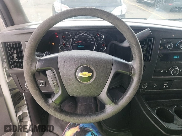 2013 Chevrolet Express Cargo with VIN 1GCWGFCA4D1142736, listed as a IAAI auction lot 42854305 with 128,585 mi miles and . Bid and sale history available at DreamBid. Image 12.