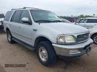 1997 Ford Expedition XLT z VIN 1FMFU18L1VLB45603, wystawiony jako IAAI lot #41899137 z przebiegiem 224 418 mil mil oraz . Historia ofert i sprzedaży dostępna na DreamBid. Obrazek 1.