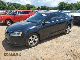 2012 Volkswagen Jetta TDI w/Premium & Nav z VIN 3VWLL7AJ7CM367139, wystawiony jako Copart lot #60587835 z przebiegiem 238 919 mil mil oraz Czysty tytuł • Clean title. Historia ofert i sprzedaży dostępna na DreamBid. Obrazek 1.