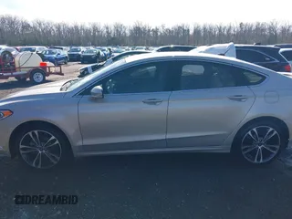 2017 Ford Fusion Titanium with VIN 3FA6P0K91HR309740, listed as a IAAI auction lot 41373824 with 95,499 mi miles and . Bid and sale history available at DreamBid. Image 15.