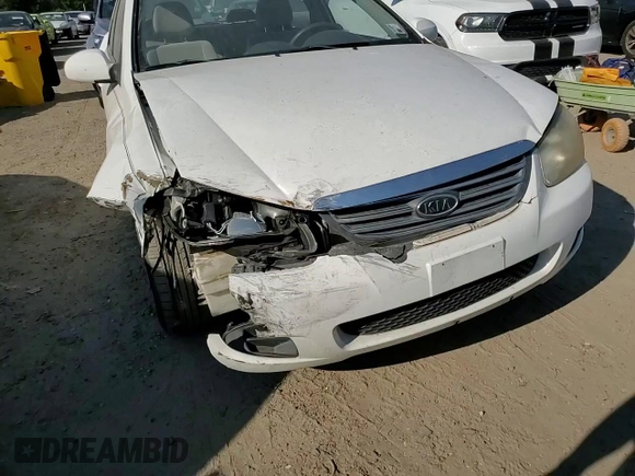 2009 Kia Spectra LX with VIN KNAFE221295606992, listed as a Copart auction lot 72767494 with 163,041 mi miles and Salvage Title. Bid and sale history available at carsss.com. Image 11.