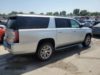 2015 GMC Yukon XL SLE with VIN 1GKS2GKC4FR678777, listed as a Copart auction lot 68642194 with 151,909 mi miles and Salvage Title. Bid and sale history available at carsss.com. Image 3.
