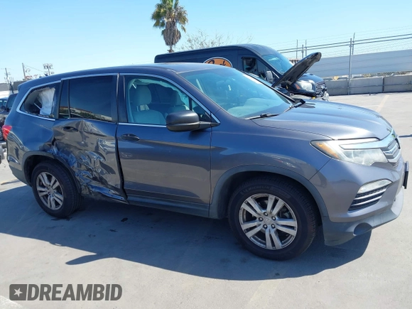 2016 Honda Pilot LX with VIN 5FNYF5H1XGB032851, listed as a IAAI auction lot 41998989 with 68,882 mi miles and . Bid and sale history available at DreamBid. Image 13.