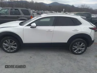 2021 Mazda CX-30 Premium with VIN 3MVDMADL5MM318729, listed as a IAAI auction lot 41645560 with 51,132 mi miles and . Bid and sale history available at DreamBid. Image 15.