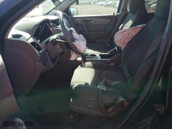 2015 Chevrolet Traverse LS with VIN 1GNKRFKD1FJ168130, listed as a Copart auction lot 74000824 with 0 mi miles and Salvage Title. Bid and sale history available at carsss.com. Image 7.