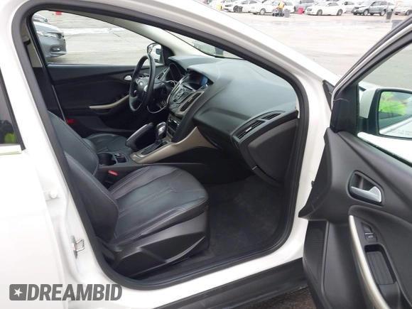 2012 Ford Focus SEL with VIN 1FAHP3H27CL314291, listed as a IAAI auction lot 41859207 with 86,830 mi miles. Bid and sale history available at carsss.com. Image 5.