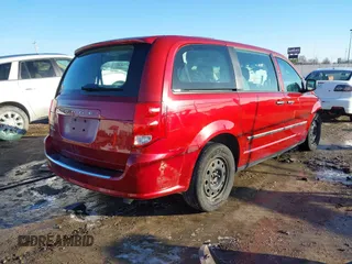 2014 Dodge Grand Caravan American Value with VIN 2C4RDGBG6ER260219, listed as a IAAI auction lot 41516864 with 162,293 mi miles and . Bid and sale history available at DreamBid. Image 4.