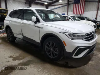 2022 Volkswagen Tiguan SE z VIN 3VV2B7AX9NM106198, wystawiony jako Copart lot #59867485 z przebiegiem 23 940 mil mil oraz Szkoda całkowita • Salvage title. Historia ofert i sprzedaży dostępna na DreamBid. Obrazek 4.