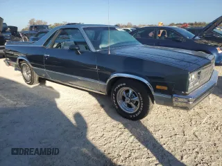 1985 Chevrolet El Camino z VIN 3GCCW80H0FS918901, wystawiony jako Copart lot #77799744 z przebiegiem 64 541 mil mil oraz Szkoda całkowita • Salvage title. Historia ofert i sprzedaży dostępna na DreamBid. Obrazek 4.