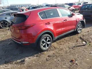 2021 Kia Sportage LX with VIN KNDPM3AC7M7938121, listed as a IAAI auction lot 40975546 with 65,319 mi miles. Bid and sale history available at carsss.com. Image 4.
