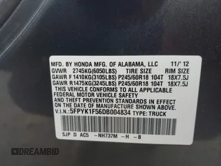 2013 Honda Ridgeline RTL with VIN 5FPYK1F56DB004834, listed as a IAAI auction lot 42706361 with 230,000 mi miles and . Bid and sale history available at DreamBid. Image 9.
