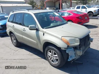 2001 Toyota RAV4 with VIN JTEGH20V210036249, listed as a IAAI auction lot 42394286 with 200,615 mi miles and . Bid and sale history available at DreamBid. Image 1.