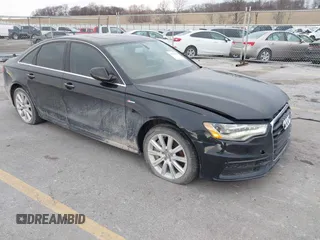 2013 Audi A6 3.0T Prestige with VIN WAUHGAFC3DN061788, listed as a IAAI auction lot 41129245 with 137,575 mi miles. Bid and sale history available at carsss.com. Image 1.