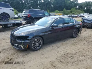 2020 BMW 5 Series with VIN WBAJB1C03LCD19170, listed as a Copart auction lot 64942594 with 66,584 mi miles and Salvage title. Bid and sale history available at DreamBid. Image 1.