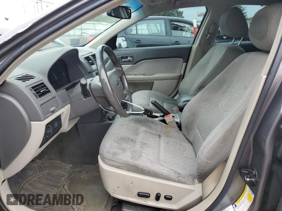 2012 Ford Fusion SEL z VIN 3FAHP0JA2CR232860, wystawiony jako Copart lot #57754735 z przebiegiem 234 638 mil mil oraz Szkody całkowita. Historia ofert i sprzedaży dostępna na DreamBid. Obrazek 7.