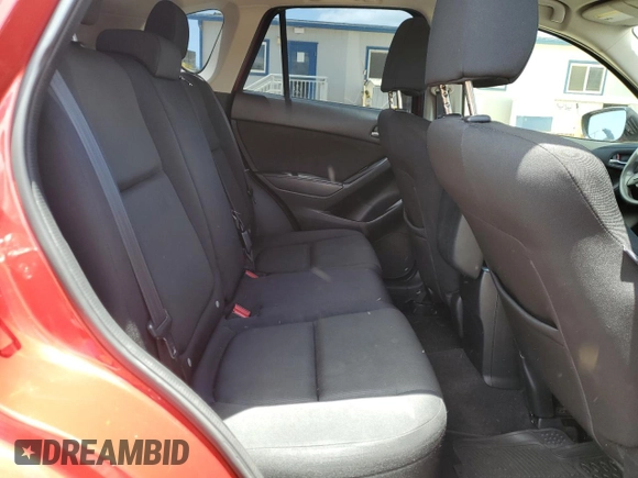 2016 Mazda CX-5 Sport с VIN JM3KE2BY4G0638102, выставлен на аукционе Copart как лот 56724445 с пробегом 189 235 миль миль и Списание • Salvage title. История ставок и продаж доступна на DreamBid. Изображение 11.