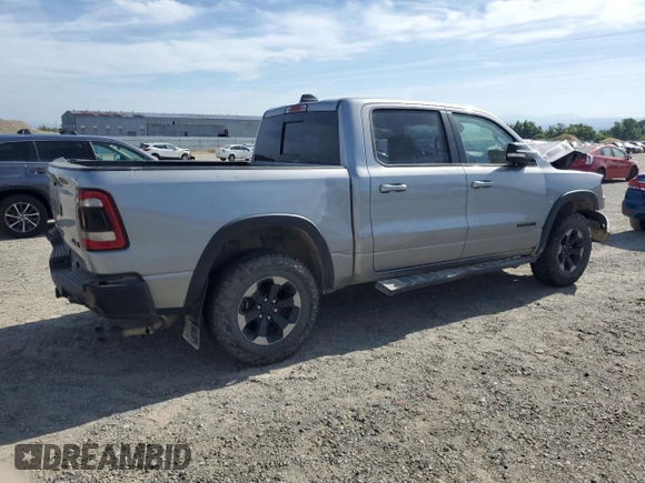2020 Ram 1500 Rebel with VIN 1C6SRFLT0LN215917, listed as a Copart auction lot 58087705 with 69,683 mi miles and Salvage title. Bid and sale history available at DreamBid. Image 3.