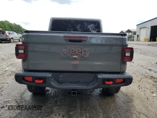 2021 Jeep Gladiator Rubicon с VIN 1C6JJTBG5ML507579, выставлен на аукционе Copart как лот 60409785 с пробегом 62 585 миль миль и Списание • Salvage title. История ставок и продаж доступна на DreamBid. Изображение 6.