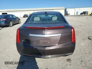 2015 Cadillac XTS Luxury z VIN 2G61M5S36F9189770, wystawiony jako Copart lot #46235475 z przebiegiem 107 451 mil mil oraz Szkoda całkowita • Salvage title. Historia ofert i sprzedaży dostępna na DreamBid. Obrazek 6.