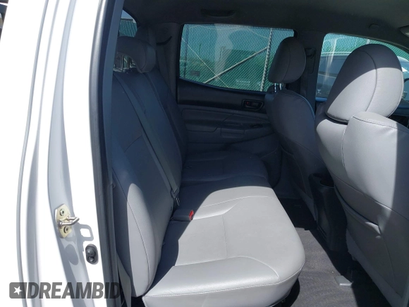 2013 Toyota Tacoma with VIN 3TMLU4EN9DM113137, listed as a IAAI auction lot 41709140 with 57,704 mi miles and . Bid and sale history available at DreamBid. Image 8.
