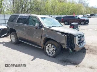 2016 GMC Yukon SLT z VIN 1GKS2BKCXGR464445, wystawiony jako IAAI lot #42138391 z przebiegiem 123 679 mil mil oraz . Historia ofert i sprzedaży dostępna na DreamBid. Obrazek 1.