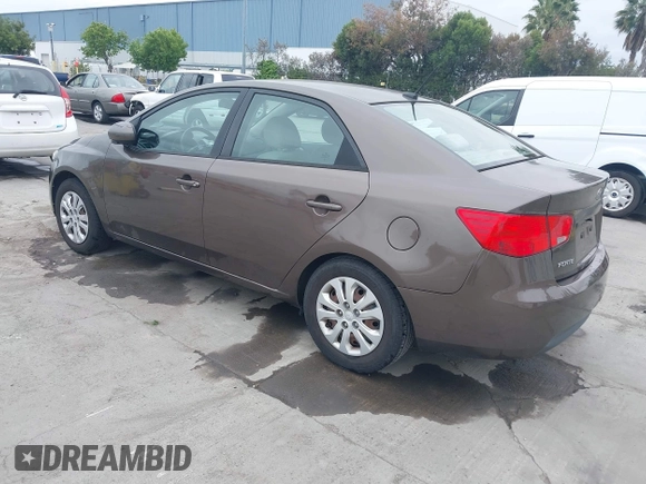 2013 Kia Forte EX with VIN KNAFU4A22D5711825, listed as a IAAI auction lot 42128778 with 112,889 mi miles. Bid and sale history available at carsss.com. Image 3.