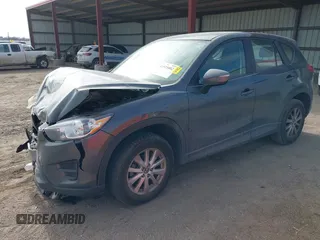 2016 Mazda CX-5 Sport with VIN JM3KE4BY0G0623365, listed as a IAAI auction lot 41525002 with 127,674 mi miles and . Bid and sale history available at carsss.com. Image 2.
