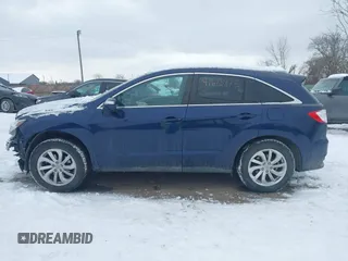 2016 Acura RDX Technology with VIN 5J8TB3H50GL008893, listed as a IAAI auction lot 41613475 with 124,730 mi miles and . Bid and sale history available at DreamBid. Image 14.