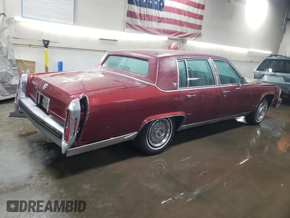 1988 Cadillac Brougham z VIN 1G6DW51Y2JR766782, wystawiony jako Copart lot #83797924 z przebiegiem 63 601 mil mil oraz Szkody całkowita. Historia ofert i sprzedaży dostępna na DreamBid. Obrazek 3.