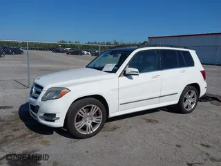 2015 Mercedes-Benz GLK-Class GLK 350 with VIN WDCGG5HB6FG338932, listed as a IAAI auction lot 42027674 with 107,182 mi miles. Bid and sale history available at carsss.com. Image 2.