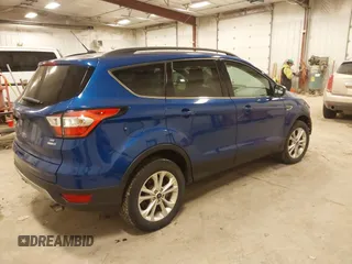 2018 Ford Escape SE with VIN 1FMCU9GD4JUA83470, listed as a IAAI auction lot 41272882 with 105,661 mi miles. Bid and sale history available at carsss.com. Image 4.