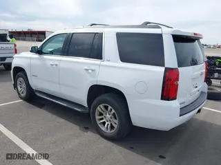 2016 Chevrolet Tahoe LS with VIN 1GNSCAKC1GR139869, listed as a IAAI auction lot 41642073 with 128,380 mi miles. Bid and sale history available at carsss.com. Image 3.